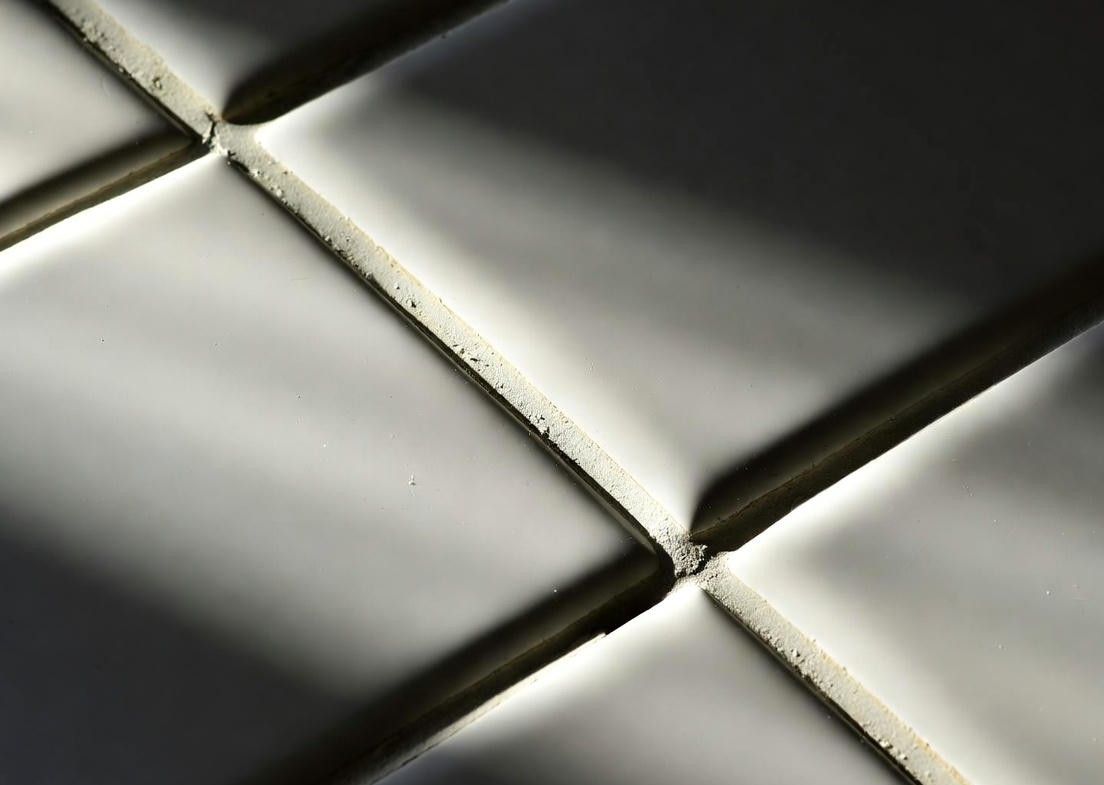 macro image of clean tiles and grout